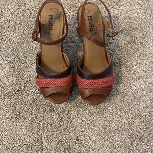 Worn few times tiny tear on the foot right corner. 5 inch heals